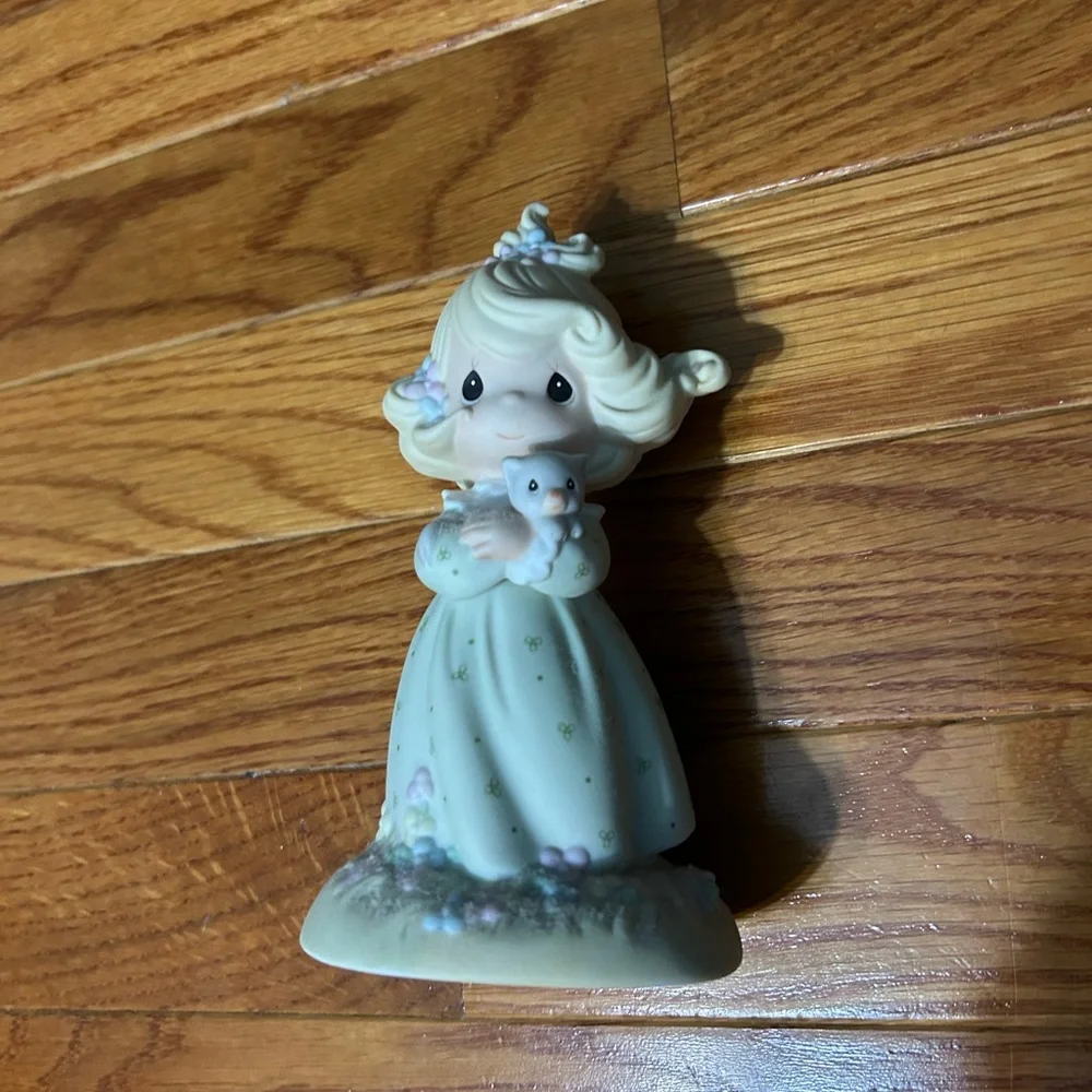 Charming Figurine with Blonde Hair and Blue Dress